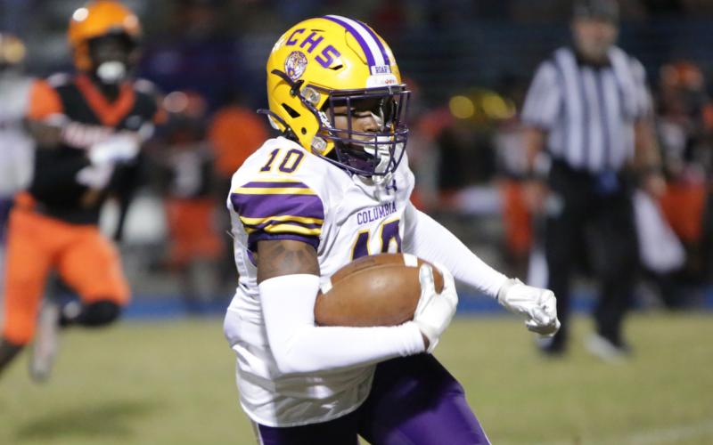 Columbia receiver Keeven Young races up the field after a catch against Orange Park last Friday. (BRENT KUYKENDALL/Lake City Reporter)