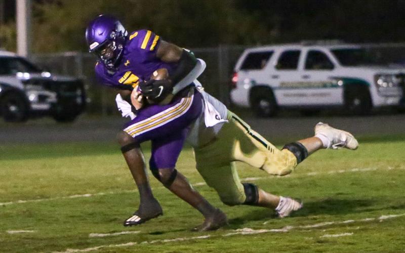 Columbia linebacker Jaden Robinson is tackled just short of the goal line after recovering a fumble against Lincoln during Friday’s Region 1-3S quarterfinal. (BRENT KUYKENDALL/Lake City Reporter)