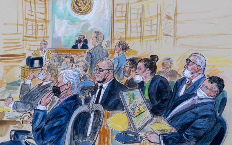 Former Honda of Lake City General Manager Kelly Meggs (second from right) sits alongside Oath Keepers leader Stewart Rhodes (second from left) in this courtroom sketch during a seditious conspiracy trial. (AP File)