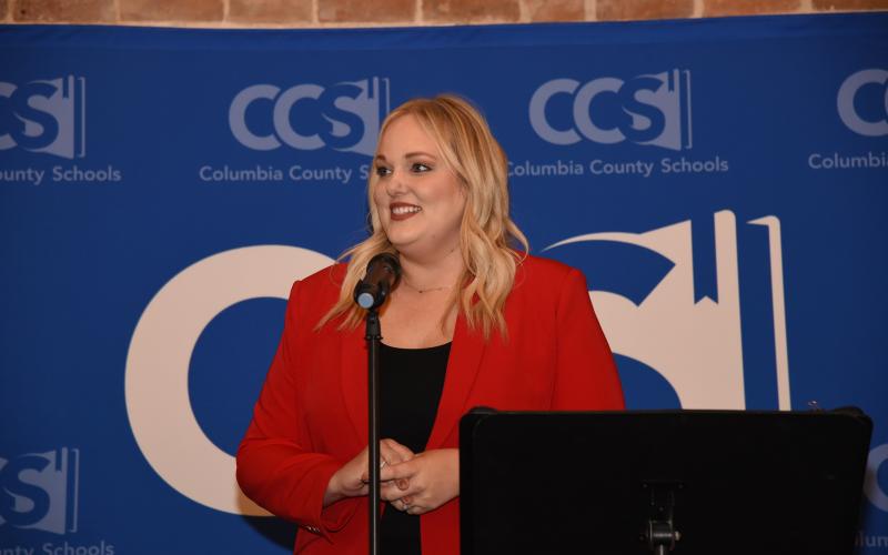 Dianna Swisher, the director of the Columbia County Public Schools Foundation, speaks at a previous year’s Teacher of the Year banquet. (FILE)
