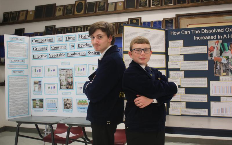 Fort White Middle School students Evan McKinney (left) and Cyler Robinson won FFA national titles for their work with hydroponics. McKinney teamed up with Marshall Bussey (not pictured) on his winning project. (TONY BRITT/Lake City Reporter)
