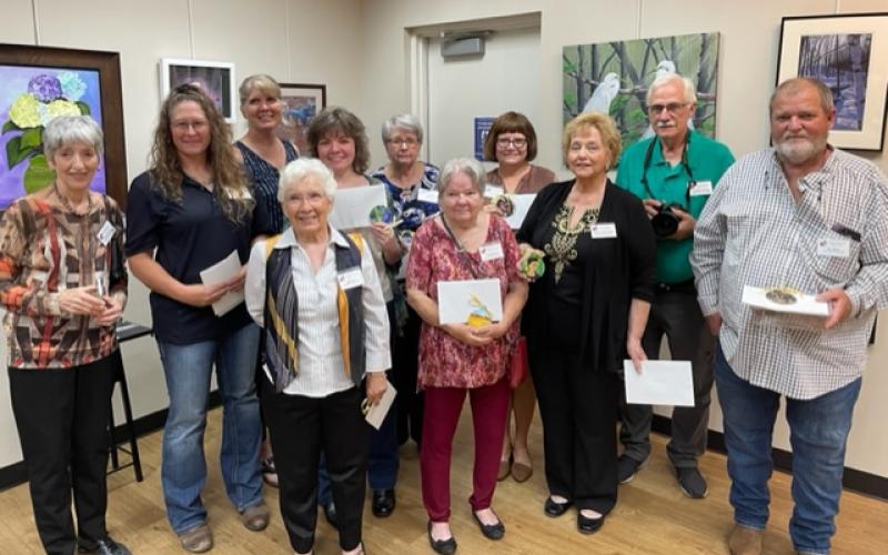Winning artists pose for a photo at the awards ceremony. (ANDRE MARCIL/Special to the Reporter)