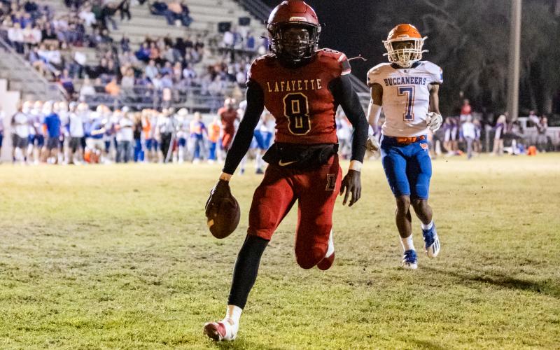Lafayette running back JT Cook scores a touchdown against Branford during last Friday’s Region 3-1R quarterfinals. (JACK HOWDESHELL/Special to the Reporter)