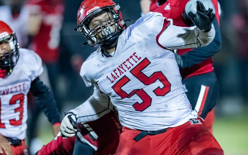 Lafayette defensive lineman Emanuel Watkins celebrates after a tackle against Hilliard during the Region 3-1R semifinals on Friday. (JACK HOWDESHELL/Special to the Reporter)