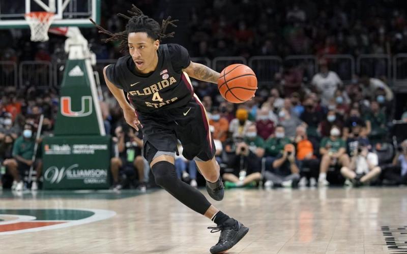 Florida State guard Caleb Mills drives to the basket against Miami on Jan. 22 in Coral Gables. (AP FILE)