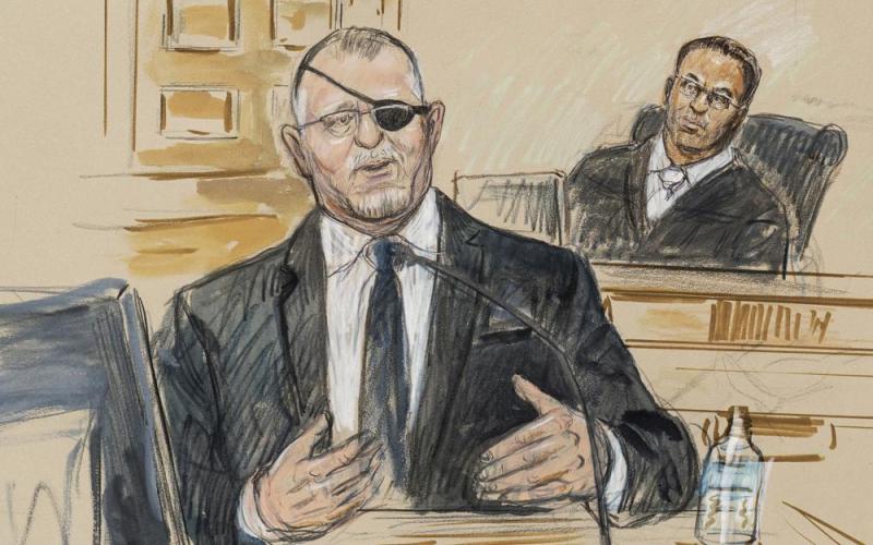 This artist sketch depicts the trial of Oath Keepers leader Stewart Rhodes, left, as he testifies before U.S. District Judge Amit Mehta on charges of seditious conspiracy on Nov. 7. (DANA VERKOUTEREN/Associated Press)
