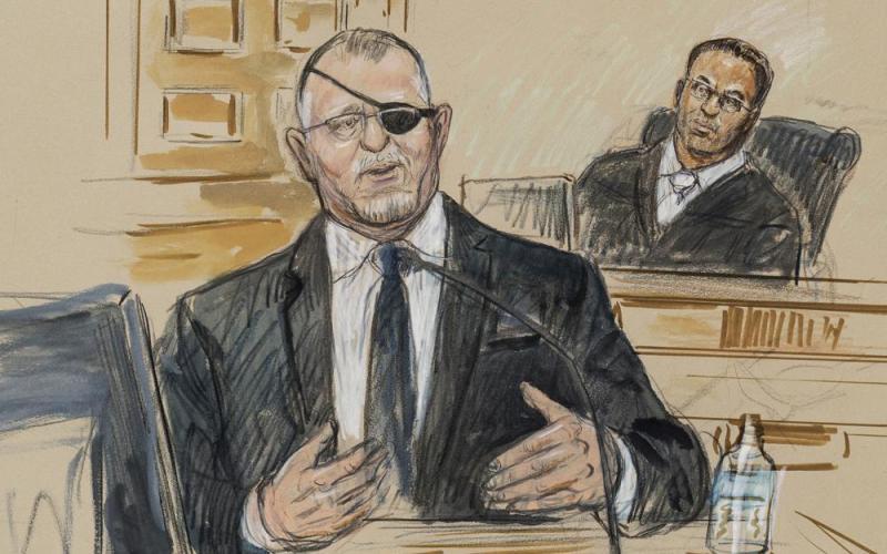 This artist sketch depicts the trial of Oath Keepers leader Stewart Rhodes, left, as he testifies before U.S. District Judge Amit Mehta on charges of seditious conspiracy on Nov. 7. (DANA VERKOUTEREN/Associated Press)
