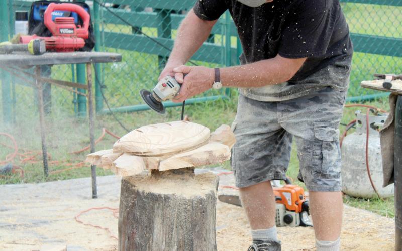 A chain saw artist works at a previous Old Tyme Farm Days event at the Spirit of the Suwannee Music Park. (COURTESY)