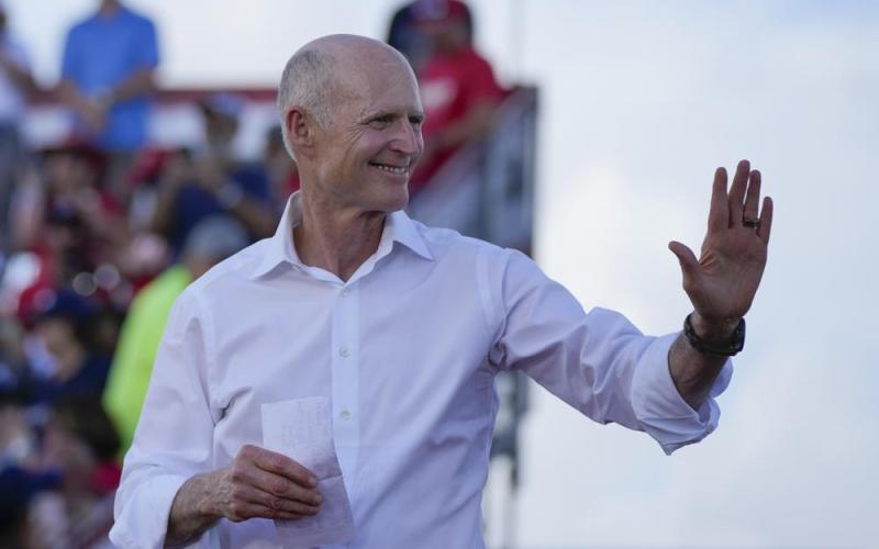 Sen. Rick Scott arrives to speak before former President Donald Trump at a campaign rally in support of the campaign of Sen. Marco Rubio on Nov. 6. (REBECCA BLACKWELL/AP File)