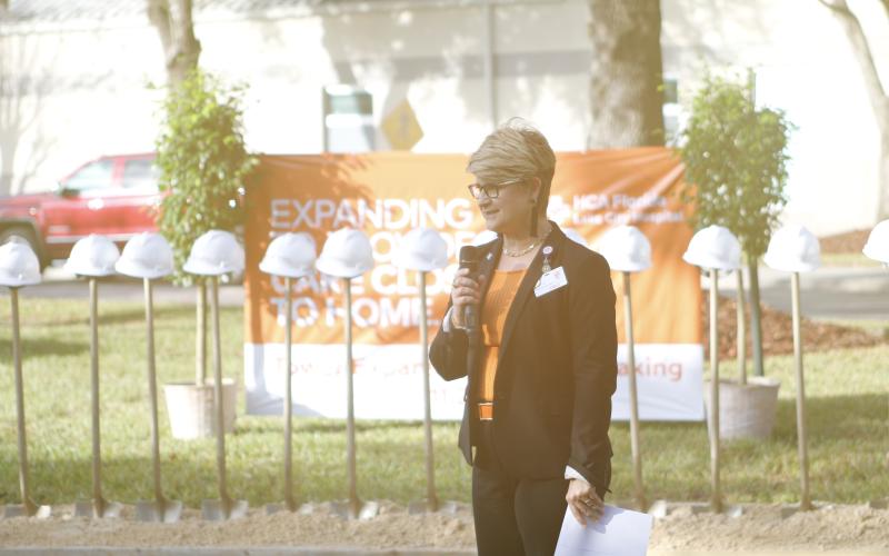 HCA Florida Lake City Hospital CEO Jill Adams announces the $88 million expansion project Tuesday prior to a ceremonial groundbreaking. (JAMIE WACHTER/Lake City Reporter)