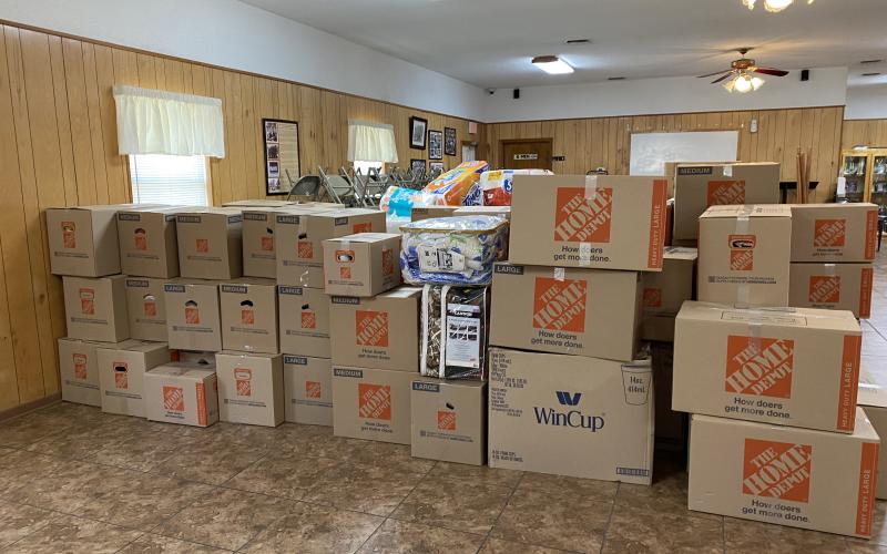 Boxes of supplies sit ready to be shipped to Fort Myers last month after the devastation of Hurricane Ian swept through southwest Florida. (COURTESY)