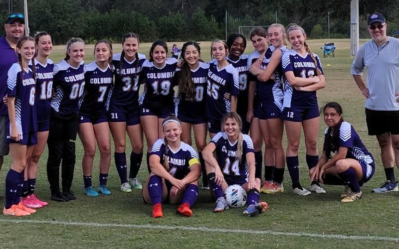 Columbia's girls soccer team: head coach Chip Garner (from left), Audrey Fender, Skyler Ziegaus, Haley Schraeder, Penelope Wheeldon, Sydney Rivas, Sally Sparks, Ashley Caballero, Caitlyn Tolley, Olivia Kelly, Sadie Sparks, Kyndall Norris, Lilly Schneider, Carla Medina-Rodriguez and Coach Raul Medina-Muniz. In front are Krystin Hughes and Mia Brasel. (COURTESY)