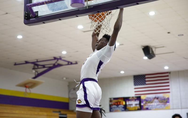 Columbia forward Ty'jahn Wright dunks against Clay on Dec. 7. (BRENT KUYKLENDALL/Lake City Reporter)