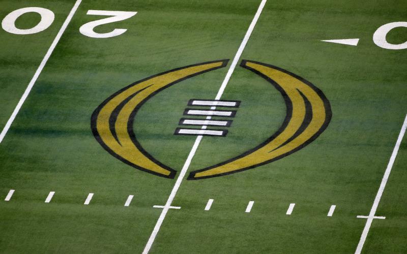 The College Football Playoff logo is shown on the field at AT&amp;T Stadium before the Rose Bowl between Notre Dame and Alabama on Jan. 1, 2021 in Arlington, Texas. (AP FILE)