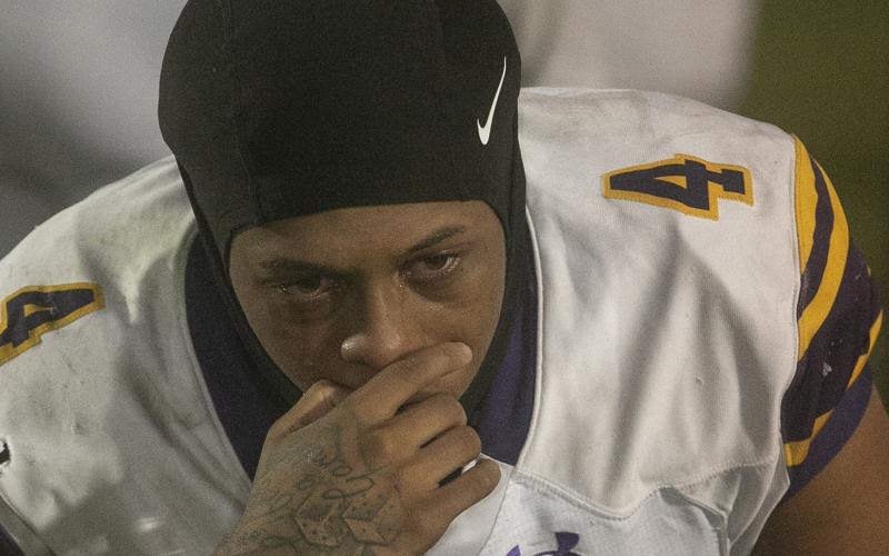 Columbia senior Dailyn Bradley sheds tears after the Tigers lost to Lake Wales at Legion Field on Friday night in a Class 3S state semifinal. (MICHAEL WILSON/Special to the Reporter)