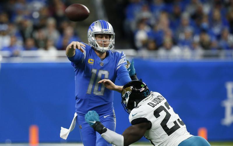 Detroit Lions quarterback Jared Goff is pressured by Jacksonville Jaguars linebacker Foyesade Oluokun during Sunday's game in Detroit. (DUANE BURLESON/Associated Press)