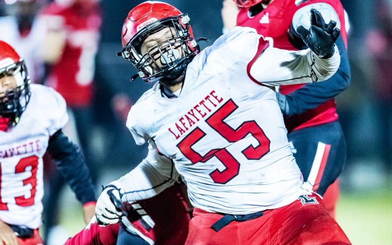 Lafayette defensive lineman Manny Watkins celebrates after making a tackle against Hilliard on Sept. 16. The Hornets won 21-14. (JACKO HOWDESHELL/Special to the Reporter)