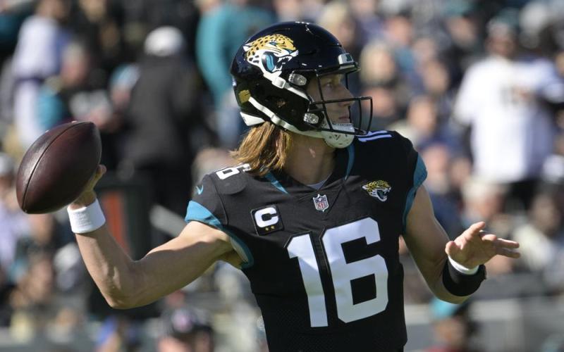 Jacksonville Jaguars quarterback Trevor Lawrence throws a pass against the Dallas Cowboys on Sunday in Jacksonville. (PHELAN M. EBENHACK/Associated Press)