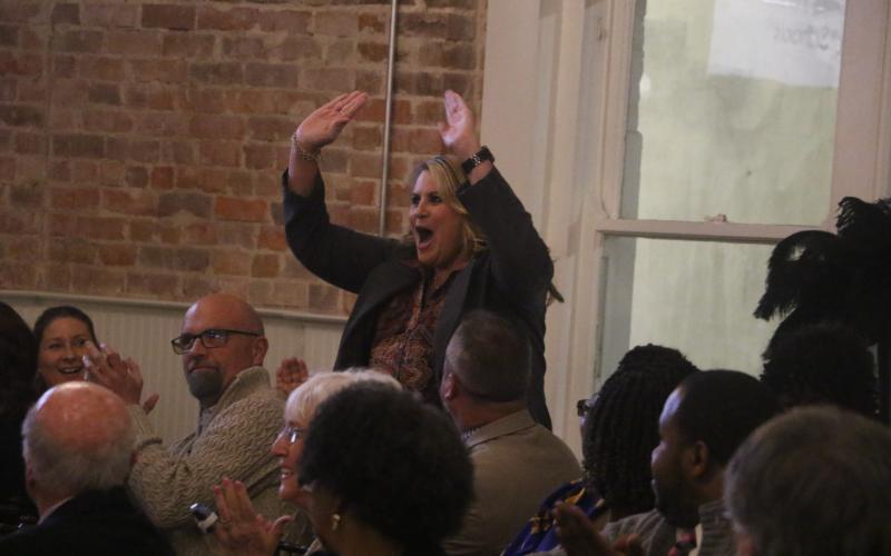 Richardson Sixth Grade Academy Principal Lisa Lee reacts after being named the Columbia County School District’s Principal of the Year during the ‘Excellence in Education’ banquet Thursday night at The Blanche Hotel. (MORGAN MCMULLEN/Lake City Reporter)