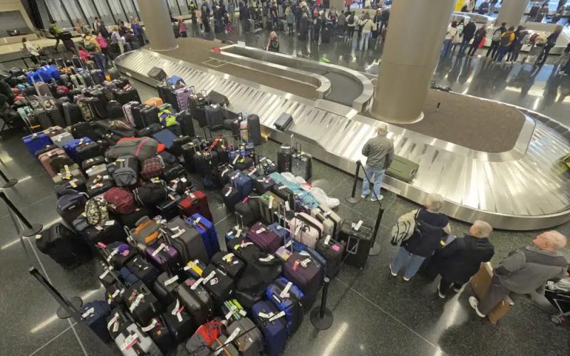 Baggage waits to be claimed at the Southwest Airlines baggage claim Tuesday at Salt Lake City International Airport. (RICK BOWMER/Associated Press)