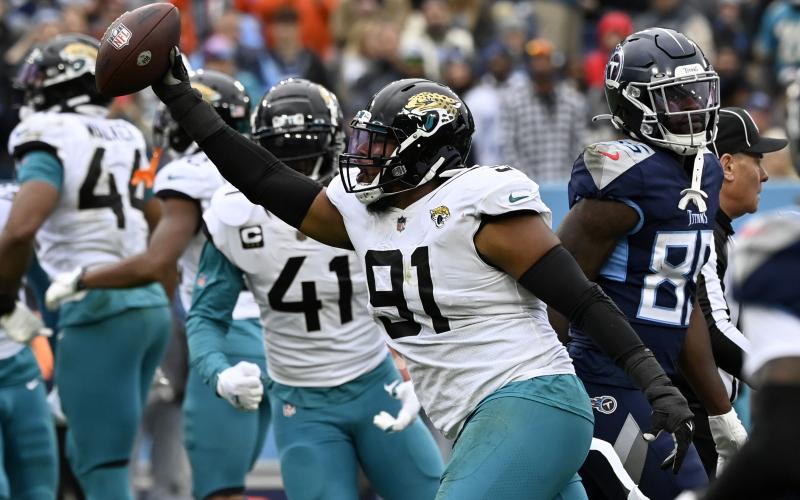 Jacksonville Jaguars defensive end Dawuane Smoot celebrates after recovering a fumble by Tennessee Titans quarterback Ryan Tannehill on Dec. 11 in Nashville, Tenn. (MARK ZALESKI/Associated Press)