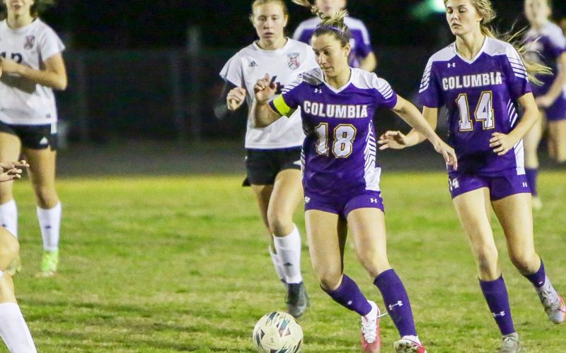Columbia’s Skyler Ziegaus pushes the ball up the field against Middleburg during Tuesday’s District 2-5A quarterfinal. (BRENT KUYKENDALL/Lake City Reporter)