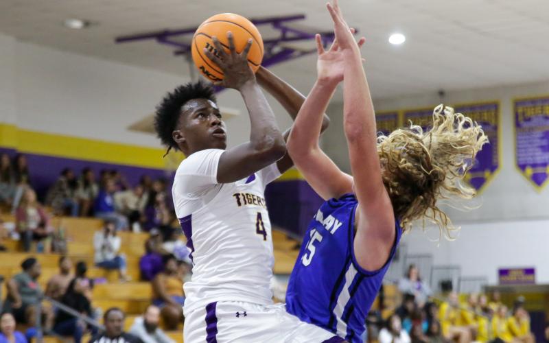 Columbia forward Ty'jahn Wright shoots against Clay on Dec. 7, 2022. (BRENT KUYKENDALL/Lake City Reporter)