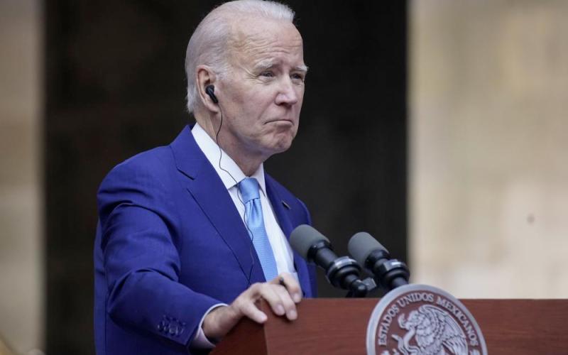President Joe Biden listens during a news conference with Mexican President Andres Manuel Lopez Obrador and Canadian Prime Minister Justin Trudeau at the North American Leaders’ Summit at the National Palace in Mexico City Tuesday. (ANDREW HARNIK/Associated Press)