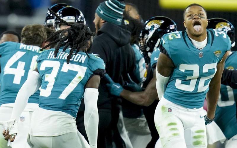 The Jacksonville Jaguars celebrate their game-winning field goal against the Los Angeles Chargers during Saturday's wild-card playoff game in Jacksonville. The Jaguars won 31-30. (JOHN RAOUX/Associated Press)