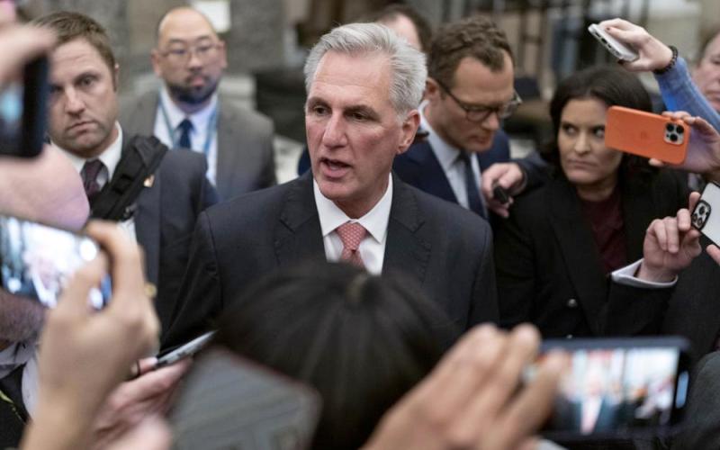 Rep. Kevin McCarthy, R-Calif., talks to reporters as he leaves the House floor after the House voted to adjourn for the evening as the House met for a third day to try and elect a speaker on Capitol Hill on Thursday. (JOSE LUIS MAGANA/Associated Press)