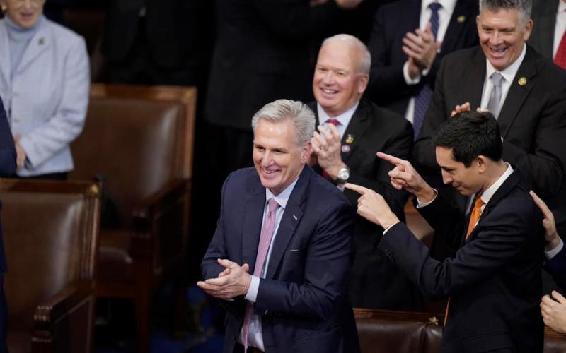 Rep. Kevin McCarthy, R-Calif., smiles after winning the 15th vote in the House chamber as the House enters the fifth day trying to elect a speaker and convene the 118th Congress in Washington, early Saturday, Jan. 7, 2023. (AP Photo/ALEX BRANDON/Associated Press)