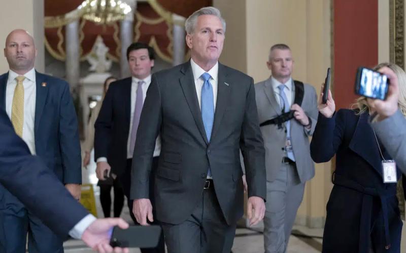 Speaker of the House Kevin McCarthy, R-Calif., talks to reporters as he walks to the speaker's ceremonial office at the Capitol in Washington on Monday. (JOSE LUIS MAGANA/Associated Press)