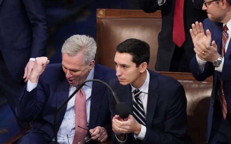 Rep. Kevin McCarthy (left) reacts after being nominated for the third round of votes for Speaker of the House on the opening day of the 118th Congress at the U.S. Capitol on Tuesday in Washington. (ALEX BRANDON/Associated Press)
