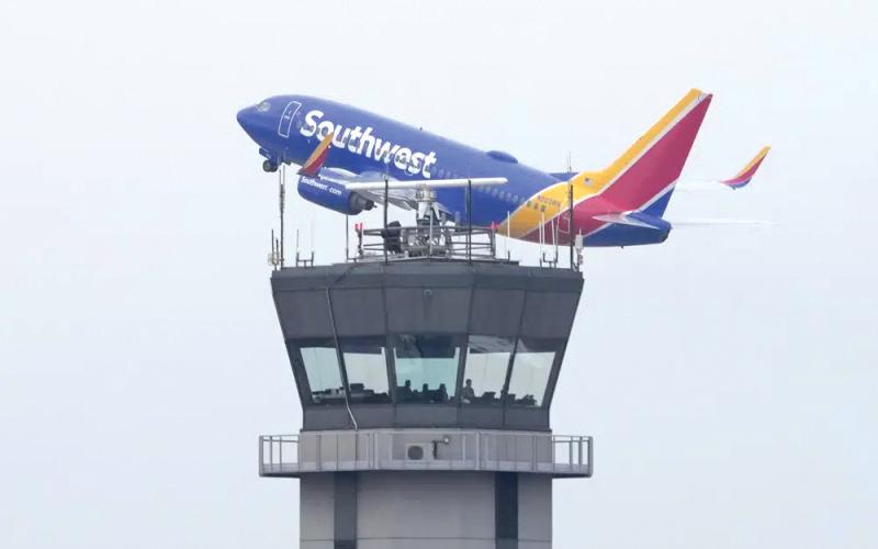 A Southwest Airlines passenger jet takes off from Chicago’s Midway Airport as flight delays stemming from a computer outage at the Federal Aviation Administration brought departures to a standstill across the U.S earlier Wednesday in Chicago. (CHARLES REX ARBOGAST/Associated Press)