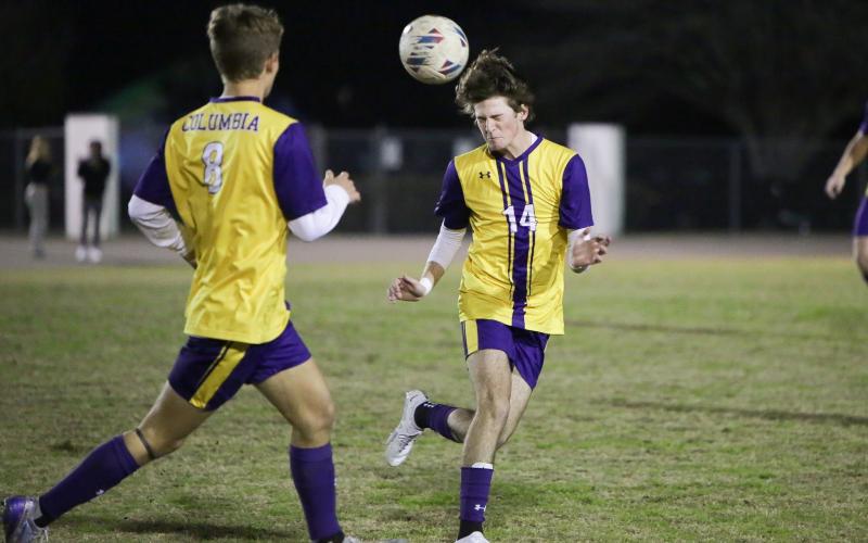 Columbia’s Bobby Shotwell heads a ball Tuesday night against Palatka. (BRENT KUYKENDALL/Lake City Reporter)
