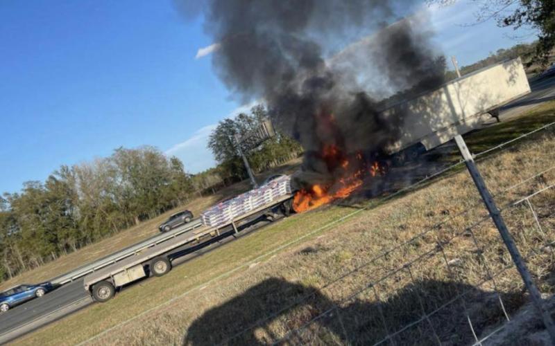 A semi truck’s cab caught on fire after hitting another truck on Interstate 75 on Sunday. (COURTESY SUWANNEE COUNTY FIRE RESCUE)