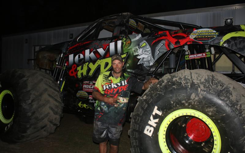 Rob Poutre, driver of the Jekyll &amp; Hyde monster truck, displays the truck after preparing it for Saturday’s 2xtreme Monster Truck live event, featuring freestyle monster trucks and motorcyclists. The event will take place at North Florida Speedway, 287 Race Track Road. (TONY BRITT/Lake City Reporter)