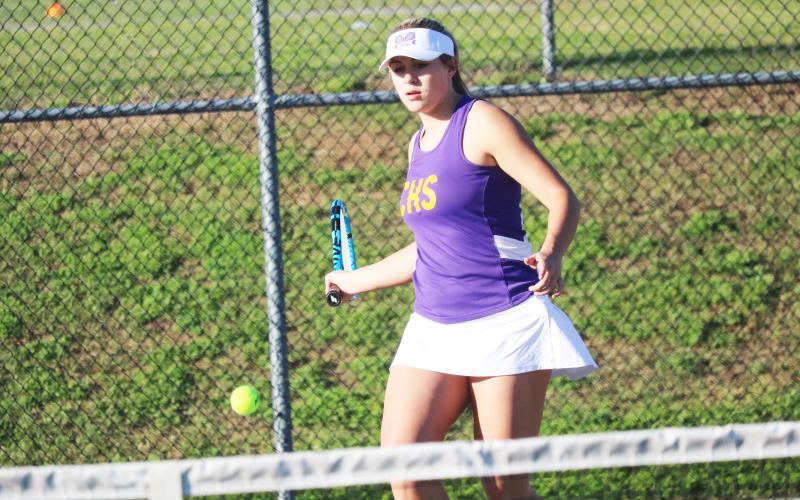 Columbia’s Cassidy O’Neal returns a shot against Baker County on Tuesday. (JORDAN KROEGER/Lake City Reporter)