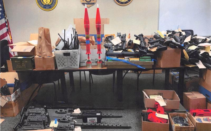 A stash of weapons found at the residence of Dustin and Greg Eward was siezed by authorities during their investigation. (COURTESY)