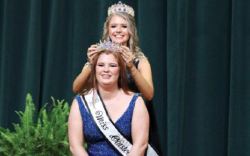 Kaylee Hamrick (seated) is crowned the 2023 Miss Olustee. (COURTESY)