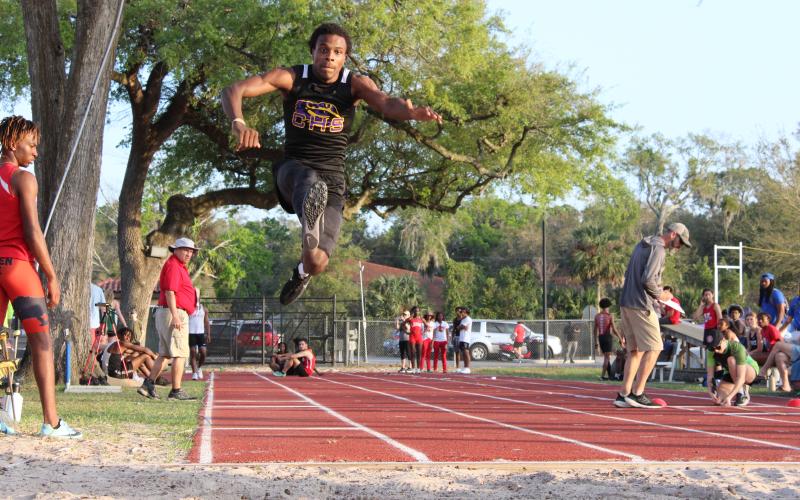 Columbia's Seth Stockton leaps in the triple jump at the Bolles Bulldog Classic on Friday. (COURTESY)