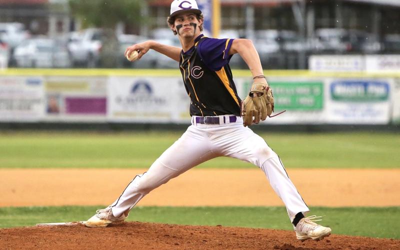 Columbia pitcher Bynton Edge winds up to pitch during Tuesday's game against Union County that was postponed due to rain. (BRENT KUYKENDALL/Lake City Reporter)