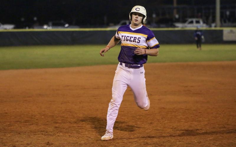 Columbia’s Josh Fernald runs to third base against Bartram Trail on Feb. 22. (BRENT KUYKENDALL/Lake City Reporter)