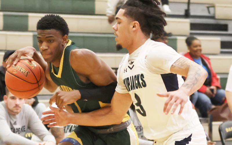 FGC guard Jeremiah Barze dribbles while being defended by Chesapeake guard  Izaiah Credle during Wednesday's consolation game in the NJCAA tournament. (COURTESY OF NJCAA)