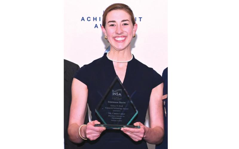 Fort White High School alumnus Cameo Lance displays her award. (COURTESY)
