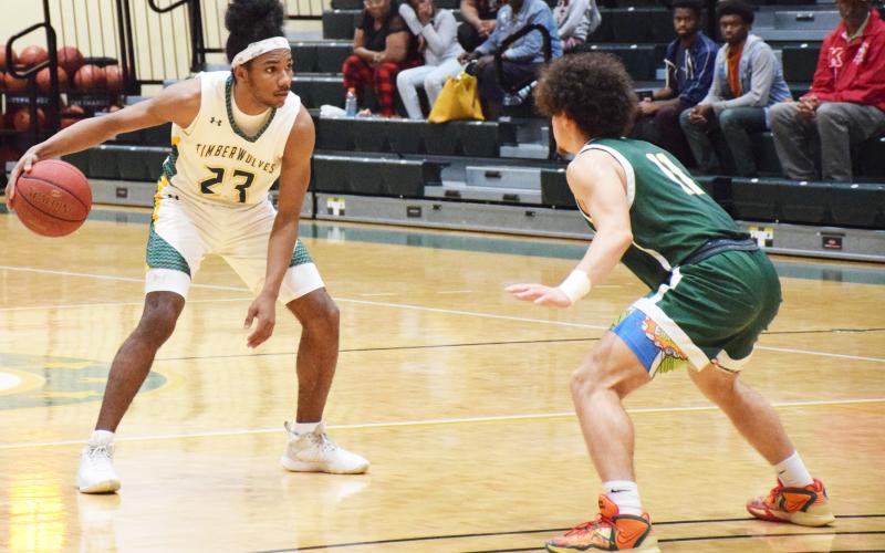 FGC guard Amayoaah Phillips initiates the action against Palm Beach State on Feb. 15. (COURTESY OF FGC)