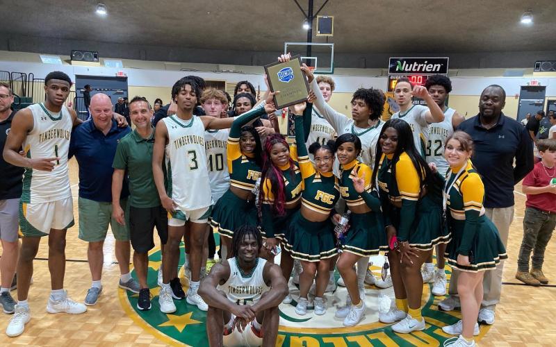 FGC celebrates after defeating Palm Beach State for the Region 8 title on Saturday. (COURTESY OF FGC)