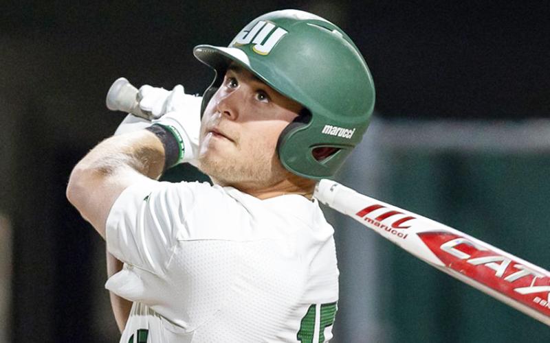 Jacksonville’s Chandler ‘Brent’ Howard watches a ball fly off his bat this season. (COURTESY OF JU ATHLETICS)