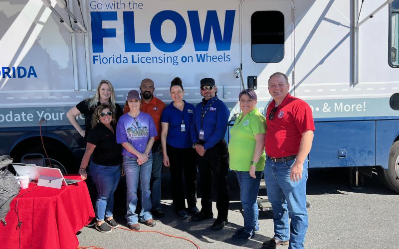 Columbia County Tax Collector Kyle Keen (right) and staff were working the Florida Licensing on Wheels mobile clinic at Saturday’s driver’s license reinstatement event. (COURTESY)