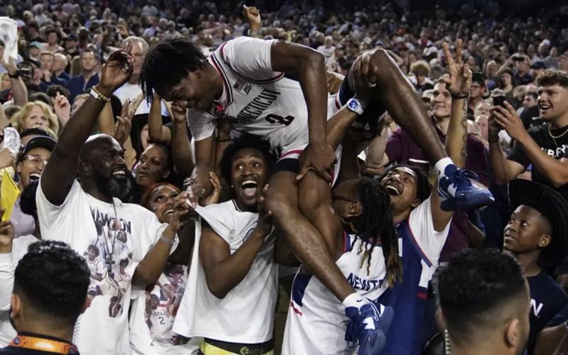 Connecticut guard Tristen Newton celebrates after their win against San Diego State in the national championship game on Monday in Houston. (BRYNN ANDERSON/Associated Press)